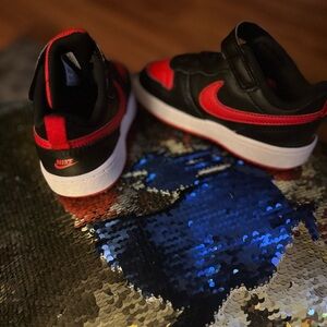 Red and black toddler Nike sneakers. Size 8/8C